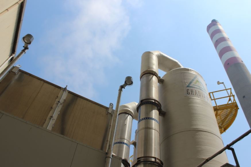 Gradiant ZLD facility in China featuring treatment vessels, process piping, and a smokestack, highlighting advanced industrial wastewater infrastructure.