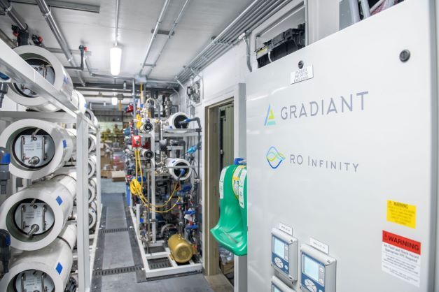 Gradiant’s RO Infinity water treatment system inside a modular plant with membrane housings and control panels.