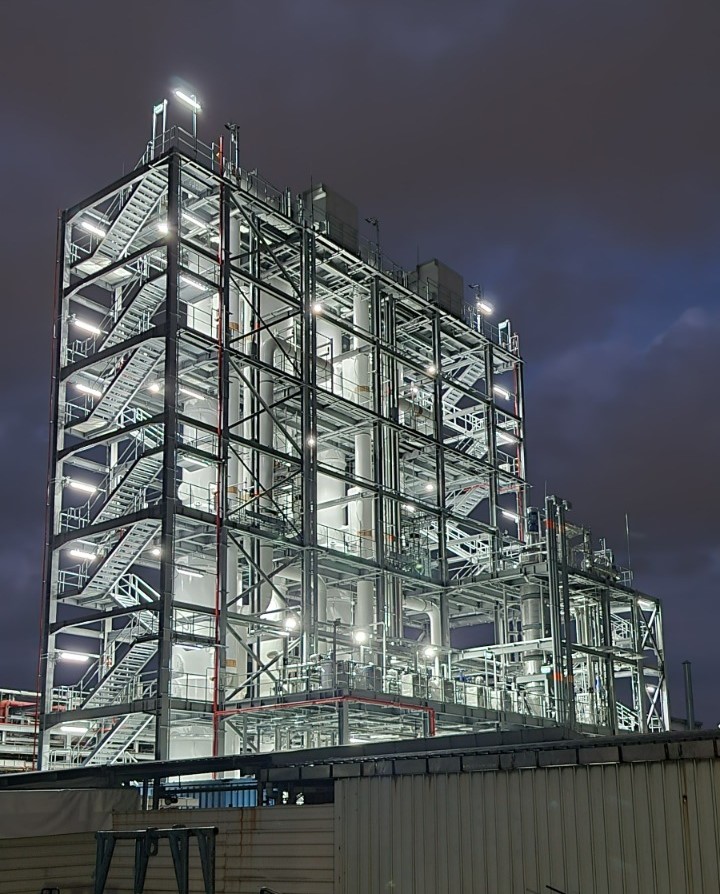Illuminated industrial water treatment facility at Singapore representing Gradiant’s digital transformation and AI-driven optimisation following the acquisition of Synauta.