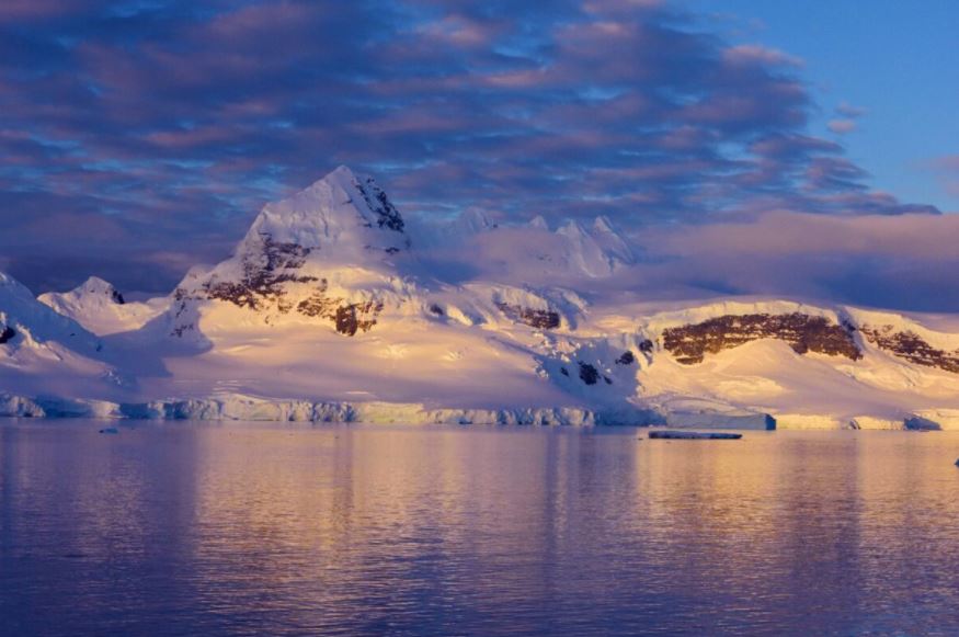 Snowy Antarctic mountain representing the remote environment where Gradiant’s CRS Water reverse osmosis systems will support potable water needs at Davis Station.